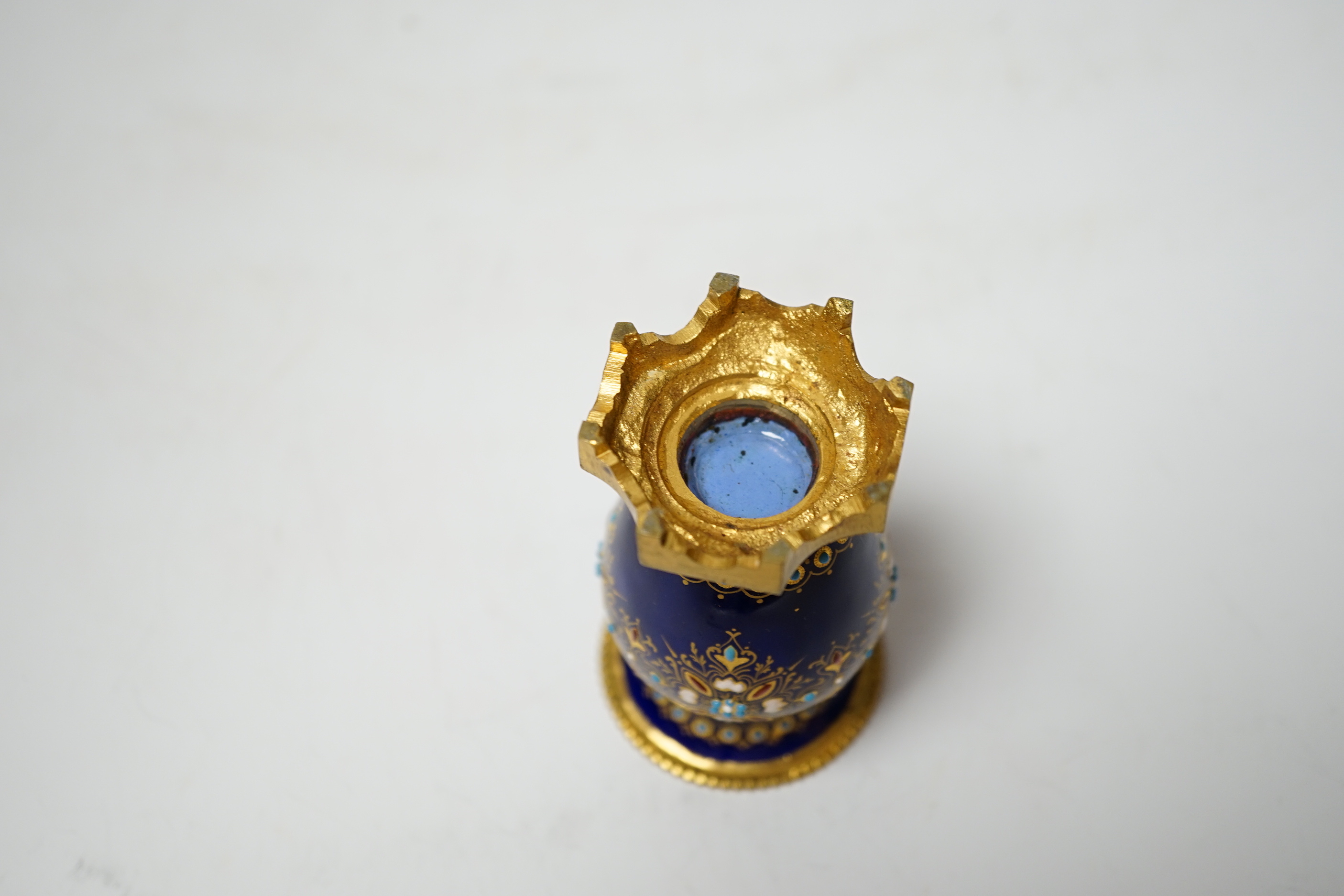 A small 19th century French jewelled blue enamel and ormolu vase, 8cm